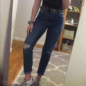 Dark wash jeans with rips